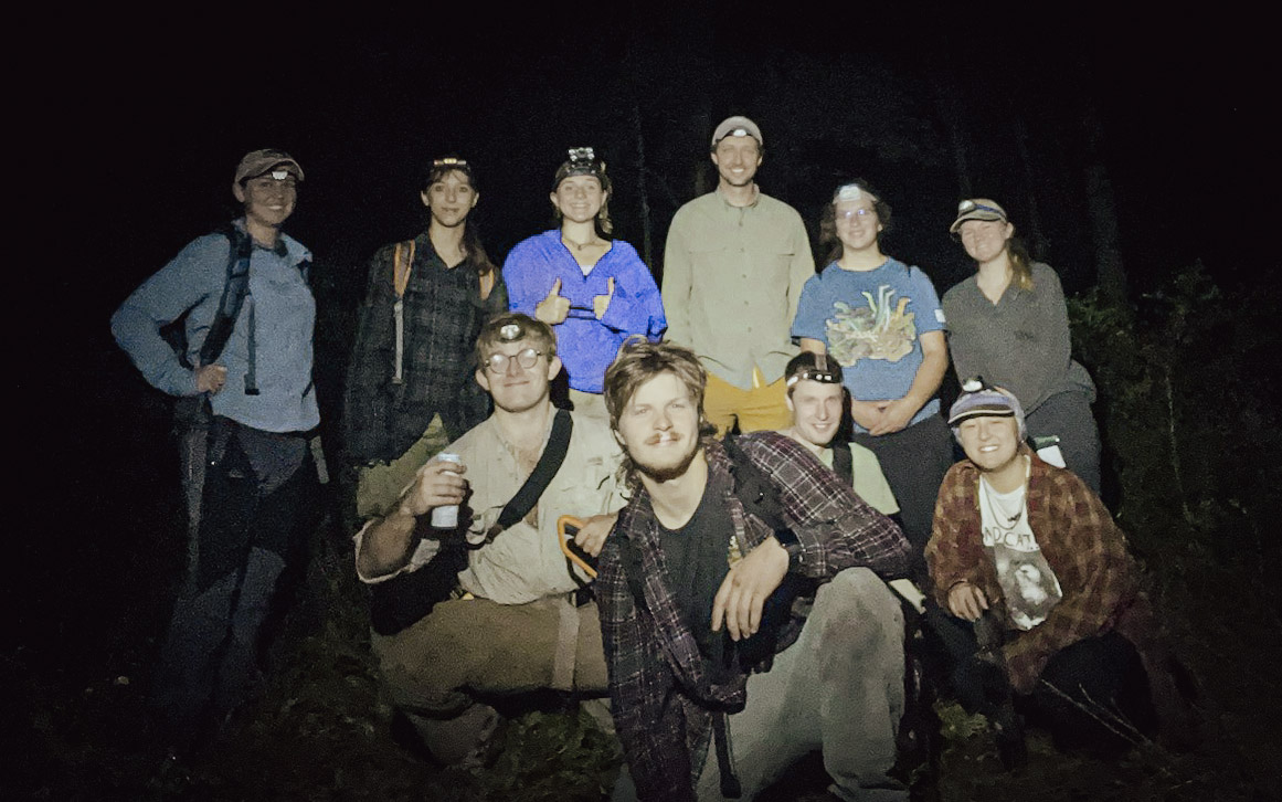 Members of the salamander field crew gathered together outdoors.