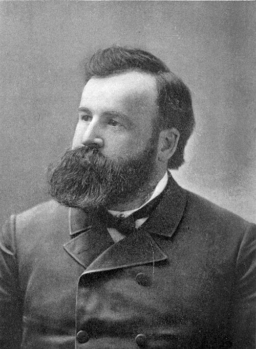 Portrait photograph of William Hamilton Gibson, bearded, in a double-breasted coat